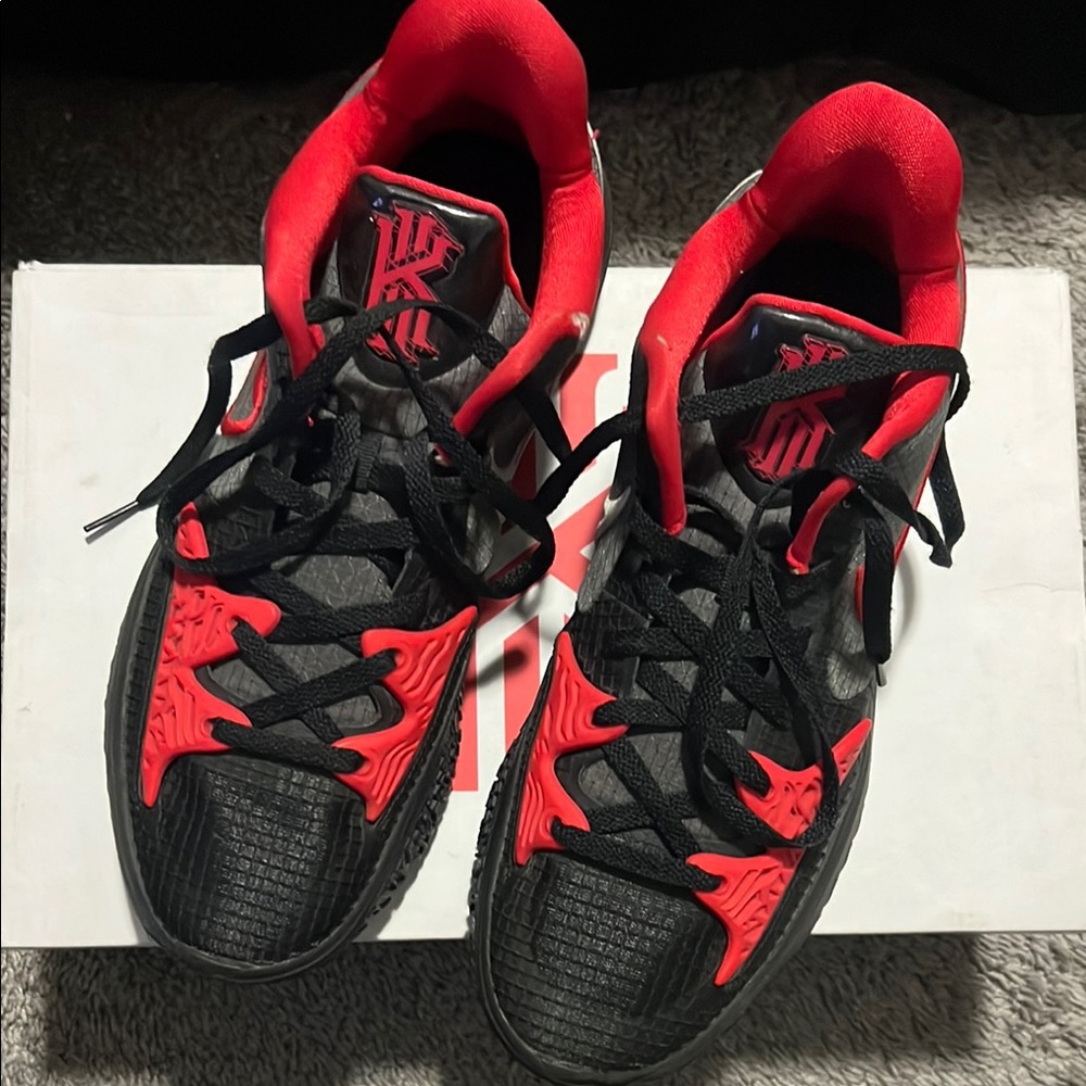 Kyrie Nike Black and Red Sneakers